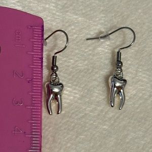 Goth silver tooth charms earrings.
